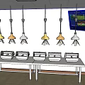 Unique Shaped Pendant Lights Above White Buffet Tables With Food Warmers In Restaurant