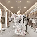 Elegant Clothing Store Interior With Arched Windows Transparent Racks Pink Flower Decorations And Mannequins