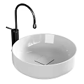 Modern Round Ceramic Wash Basin with Black Faucet and Elegant Bathroom Decor Design