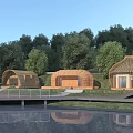 Dome Shaped Wooden Houses By Lakeside With Green Trees Grass And Calm Water