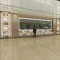 Modern Mall Store With Person Standing In Front Of Large Screen Bookshelves And Wooden Flooring
