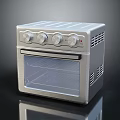 Silver Compact Countertop Oven With Stainless Steel Body Glass Door And Control Knobs Kitchen Appliance