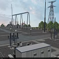 Large Industrial Factory Building Complex with Surrounding Trees Roads and Equipment