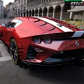 Red Sports Car Displayed On City Street