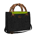 Black Pebbled Leather Handbag With Bamboo Handles Green Strap GG Logo And Structured Design