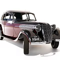 Vintage Classic Car With Deep Purple Exterior Chrome Grille And Round Headlights Design