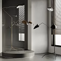Modern Floor Lamps With Brass And Black Shades In Interior Display Setting