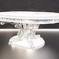 Elegant Ornate Coffee Table With Carved Wooden Top And Intricate Metal Base