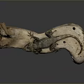 Gray Black Reptile Lizard Resting On Natural Driftwood With Gray Background