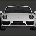 White Convertible Sports Car With Sleek Design And Black Top Alloy Wheels