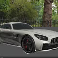 Mercedes-Benz AMG GT White Sports Car With Black Wheels Red Brake Calipers And Rear Spoiler