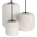 Three White Woven Pendant Lights With Lattice Design And Black Hardware
