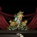 Elegant Banquet Hall with Red Curtains Stage Flower Arrangements Candles and White Chairs