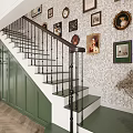 Staircase Hallway Featuring Green Walls White Steps Black Railings Framed Pictures Wooden Flooring Potted Plant