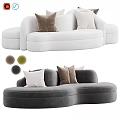 Modern Abstract Shaped Sofa With White And Gray Upholstery And Colorful Pillows