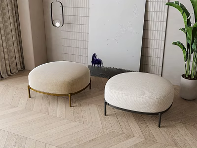 Round Cream Colored Stools With Gold And Black Legs On Light Wood Herringbone Flooring 3d model