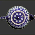 Decorative Ceramic Teapot Featuring Purple White Base And Blue Green Circular Patterns 3d model
