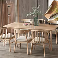 Wooden Dining Table And Chairs Set With Vase Green Plants And Wooden Wall Decor