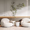Casual Sofa Set Creamy White Rounded With Green Plant White Planter Light Wall Wooden Floor