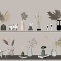 Stylish Decorative Ornament Combination On Display Shelves With Dried Plants Vases Photo Frames And Figurines