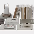Stacked Books And Magazines With Different Cover Styles And Decorative Table Lamp