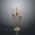 Golden Candelabra With Three Lit Candles And Spiral Decorative Base