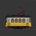 Vintage Yellow Tram With Red Trolley Pole On Stone Paved Rail Tracks