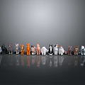 Various Colored Cat Breeds Standing Side By Side On Gray Background With Floor Reflections