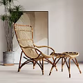 Rattan Leisure Chair With Matching Side Table And Potted Plant Near Wall Art
