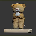 Yellow Teddy Bear Doll Praying With Folded Hands Closed Eyes On Paper Platform