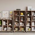 Stylish Wooden Bookcases Decorated With Books Figurines Small Plants And Photo Frames