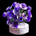 Blooming Purple Anemones In White Marble Textured Vase With Green Leaves