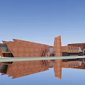 Modern Red Brick Architecture With Unique Design And Water Reflection Exterior