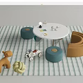 Round White Kids Table with Blue Small Stools Toys and Plush Toy on Striped Rug