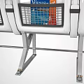 Public Chairs With Three in a Row Gray Seats White Headrests Metal Frames and Armrests