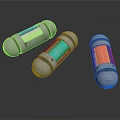Three Cylindrical Equipment With Silver Shells And Colorful Interior Components