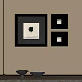 Black Framed Abstract Painting Collection with Beige Wall and Black Round Tables