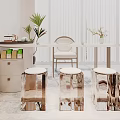 Modern Tea Table And Chairs With Transparent Stools And Green Plants Decor