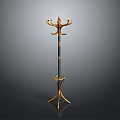 Elegant Gold And Black Coat Rack With Multiple Hooks And Circular Base Ornate Design Style