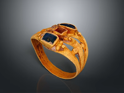 Elegant Golden Ring With Blue Gemstones And Intricate Design Elements 3d model
