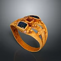 Elegant Golden Ring With Blue Gemstones And Intricate Design Elements 3d model