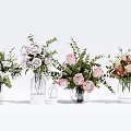 Transparent Glass Vases With Various Colorful Flowers Arranged On White Background