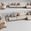 Light Beige Sectional Sofa With Gray Brown Pillows Side Table And Cozy Throw Blanket 3d model