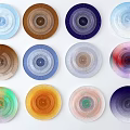 Vibrant Plate Decorations Featuring Gradient Circle Patterns In Blue Brown Purple Hues 3d model