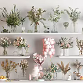 Elegant Multiple Interior Shelves With Various Vases Flowers Greenery And Pink Balloons