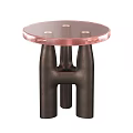 Modern Round Nesting Dining Tables With Rose Tinted Glass Top And Unique Dark Metal Legs