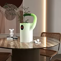 Modern Dining Area With Round Table And Unique Watering Can Decor