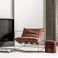 Brown Velvet Lounge Chair With Metal Frame And Matching Ottoman In Modern Interior Space