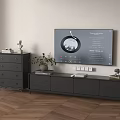 Modern Gray TV Stand In Living Room With Wall Mounted TV And Decorative Items