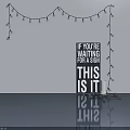 Decorative String Lights Hanging In Arch Shape With Black Sign And Motivational Message